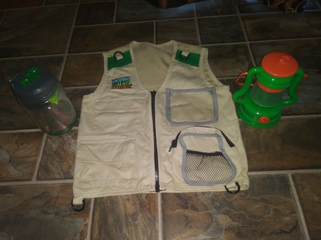 Backyard safari vest and critter jar with lantern.