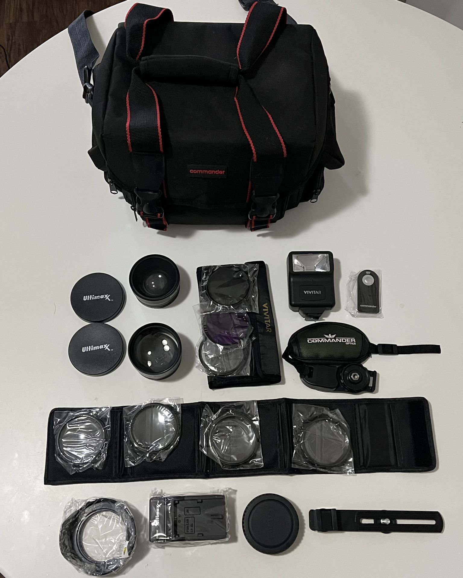 Camera bag Commander, flash Vivitar, lenses Ultimaxx and filters