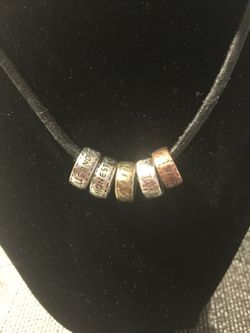 Necklace with charm of " HONESTY FAITH CIRCLE FRIEND AND LOVE ... $10