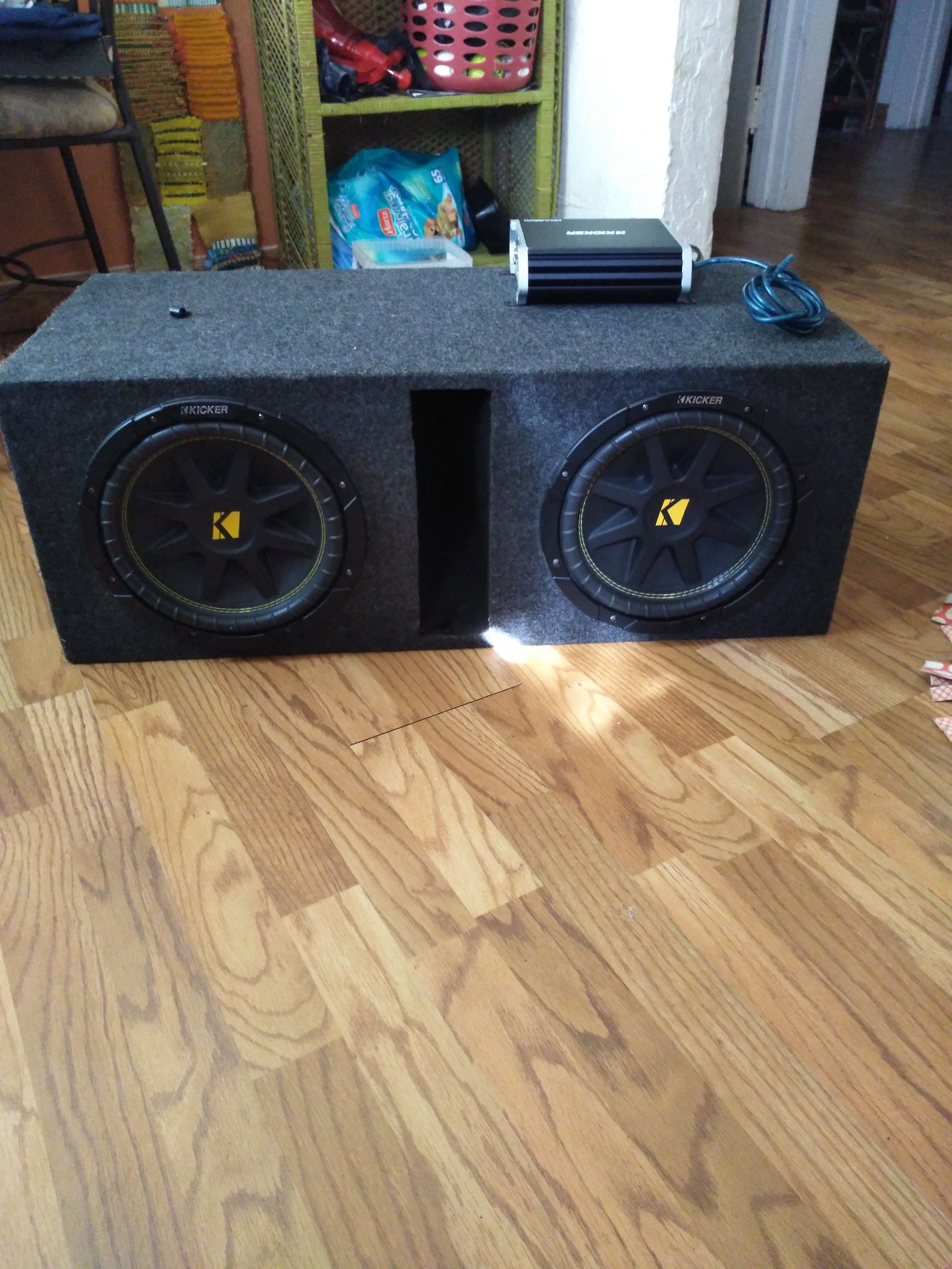 Two 12" Kicker Comp subwoofers with box and amp.