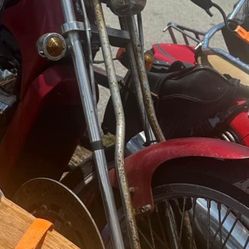 Harley type springer front end complete with handlebars trees, wheel fender and ask brakes