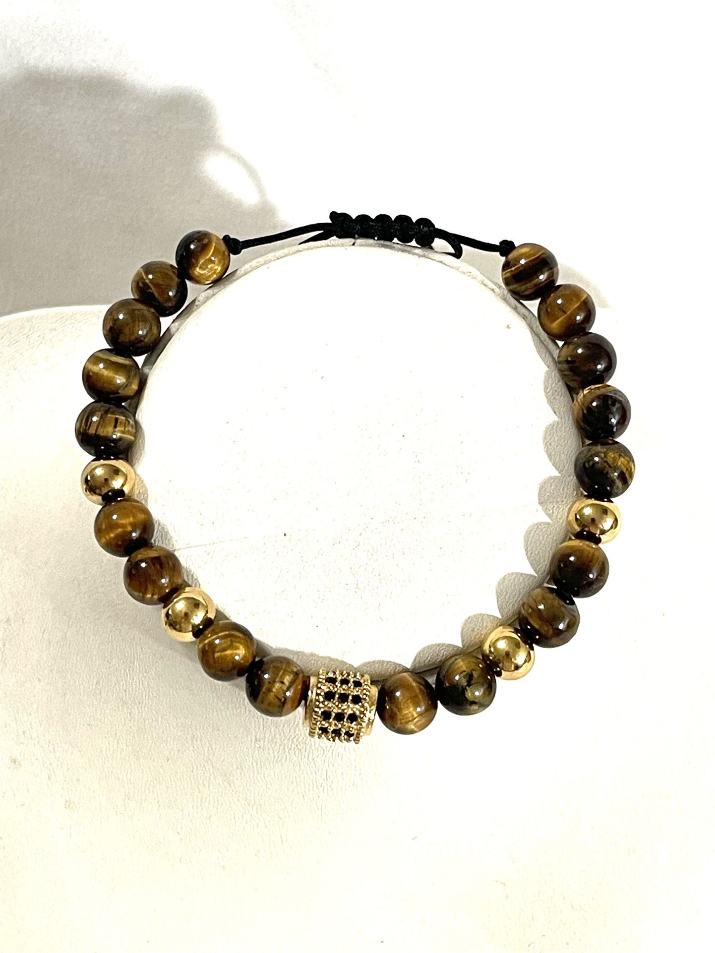 Brand New Adjustable tiger, eye bead, strand bracelet
