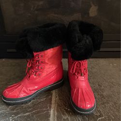 Red Coach snow boots with the fur top