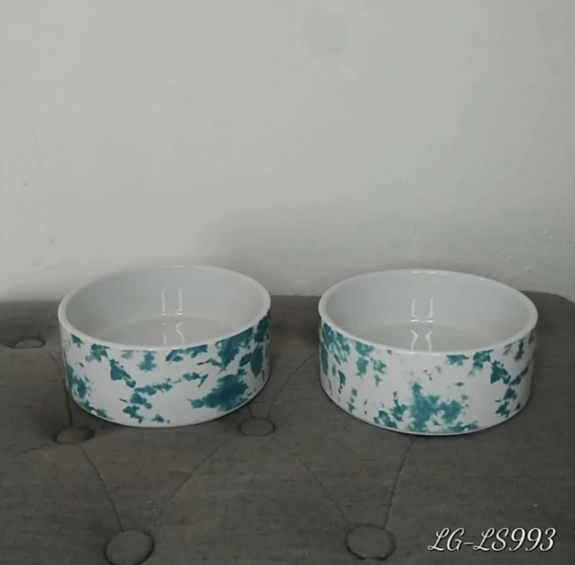 Paw and tail tie dye pets food and water bowls.