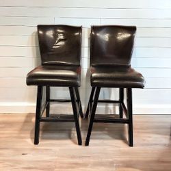 $40 for (2) Black Upholstered Wood Barstools