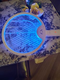 Handheld electric bug zapper