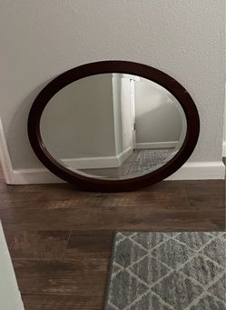 Oval Wall Mirror with Dark Wood Frame