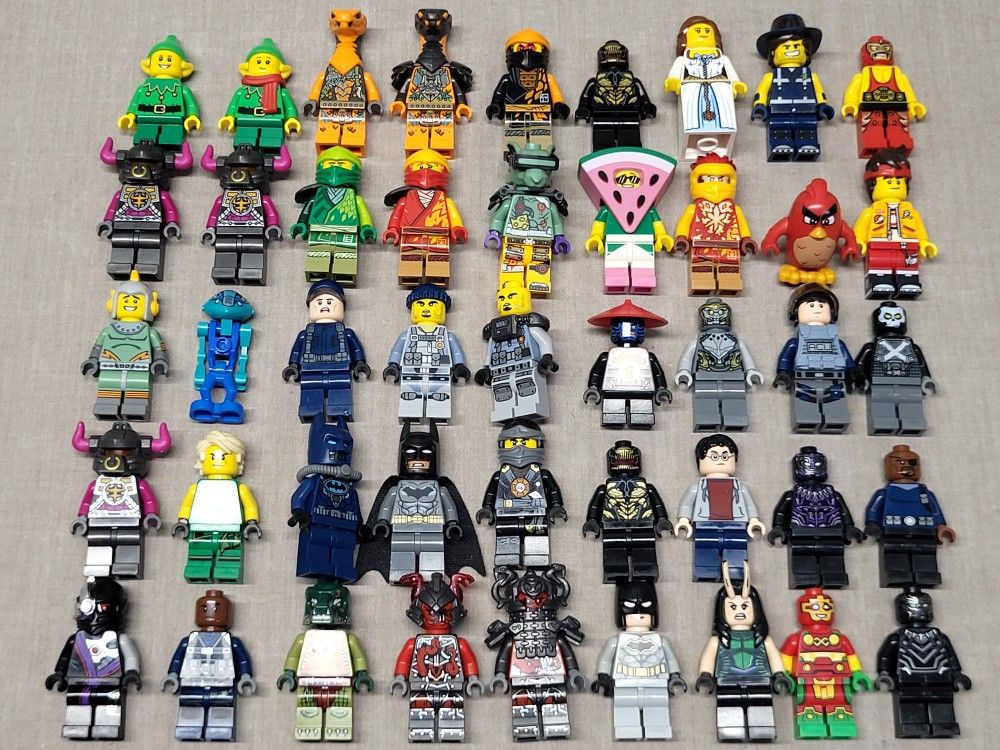 Lot Of 50 Lego Minifigures From Ninjago Jurassic World Chima Batman CMF Movie 