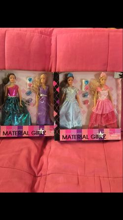 2 Barbie type dolls