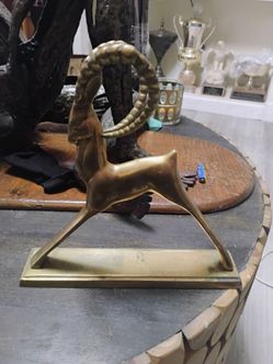 Mid-century modern brass gazelle figure. No maker's mark. Minimal age wear.