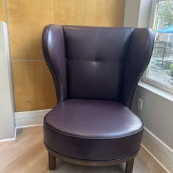 Two Large Leather Wingback chairs