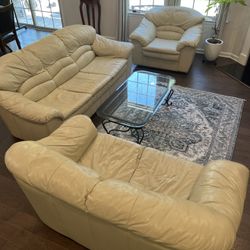 Leather Couch and Lover Seats + Table 