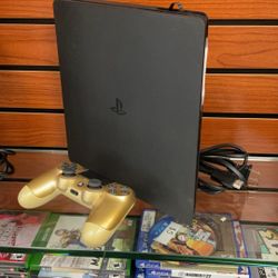 PS4 (w/ Controller & Cables)