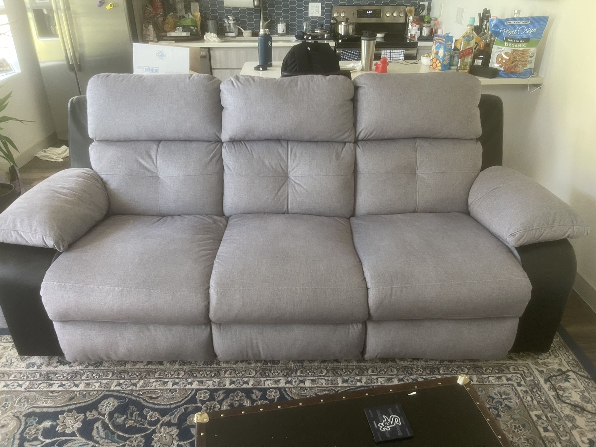 Gray Reclining Sofa with Drop Down Table