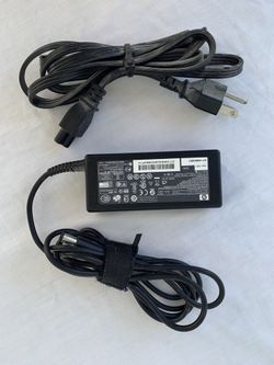 HP laptop power supply, part number 519329-001