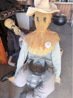 Halloween scare crow sitting