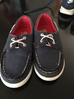 Children place shoes