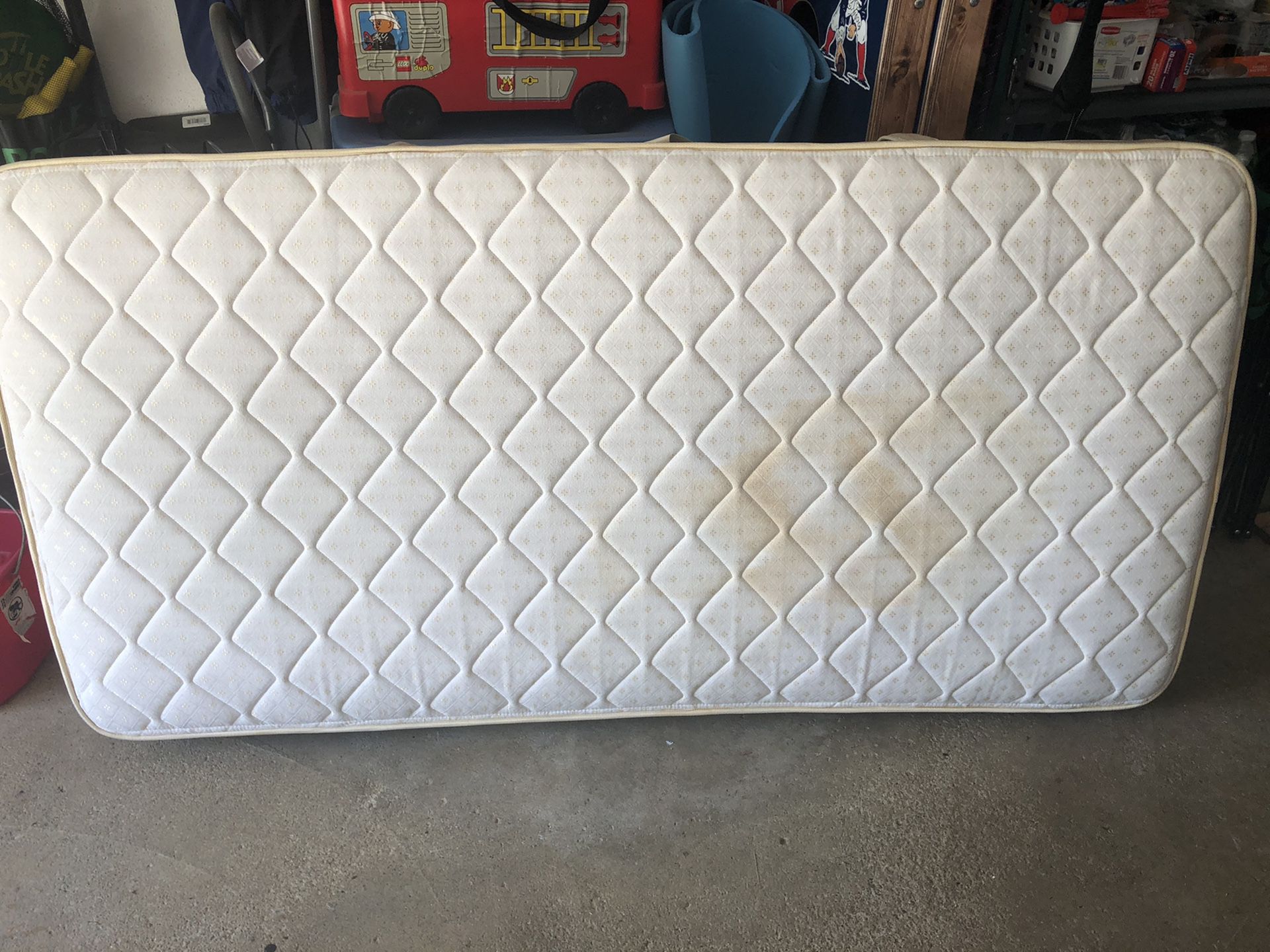 Twin mattress solid condition a few water stains