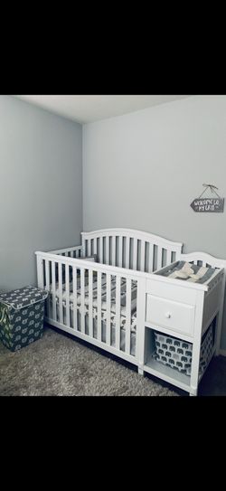 5-in-1 Convertible Crib with Changer , it grows with your child, making it a must-have!