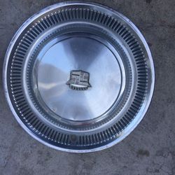 2 1970’s Cadillac hubcaps