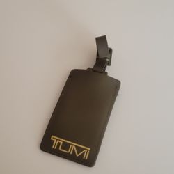 Tumi Olive Brown Leather Luggage Name Tag with Buckle Size 4 1/3" x 
2.5". Pre-owned, good shape, please see photos for details