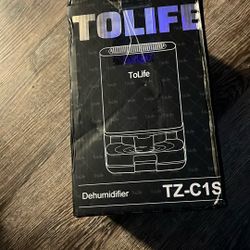 New.  Small. Tolife Dehumidifier   