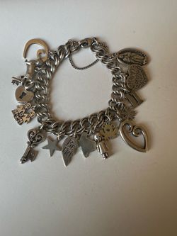 James Avery bracelete heavy and charms