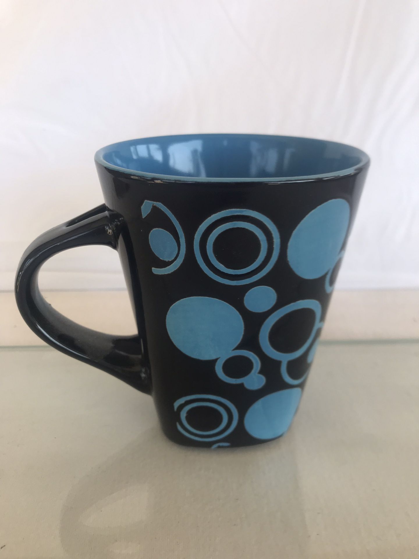Two-tone black and turquoise squared off mug