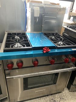 Wolf 36” slide in range with middle grill in stainless steel