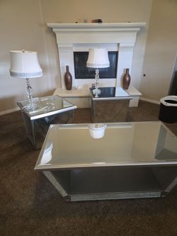 Beautiful, very sturdy and strong glass coffee table and two end tables with lamps