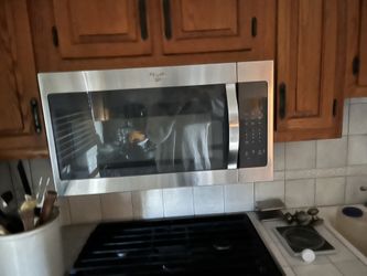 Stove with range and microwave