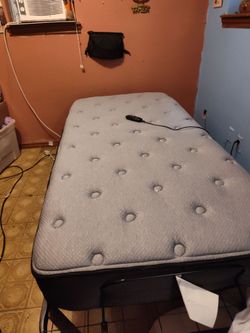 Extra long twin bed portable reclines back and forth excellent conditions used only 6 months asking $600