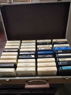8-track player and cassettes