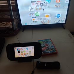 WII U IN EXCELLENT CONDITION WITH 7 GAMES AND ALL THE ACCESORIES