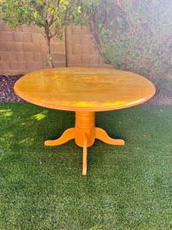 Round Wooden Drop-Leaf Pedestal Dining Table