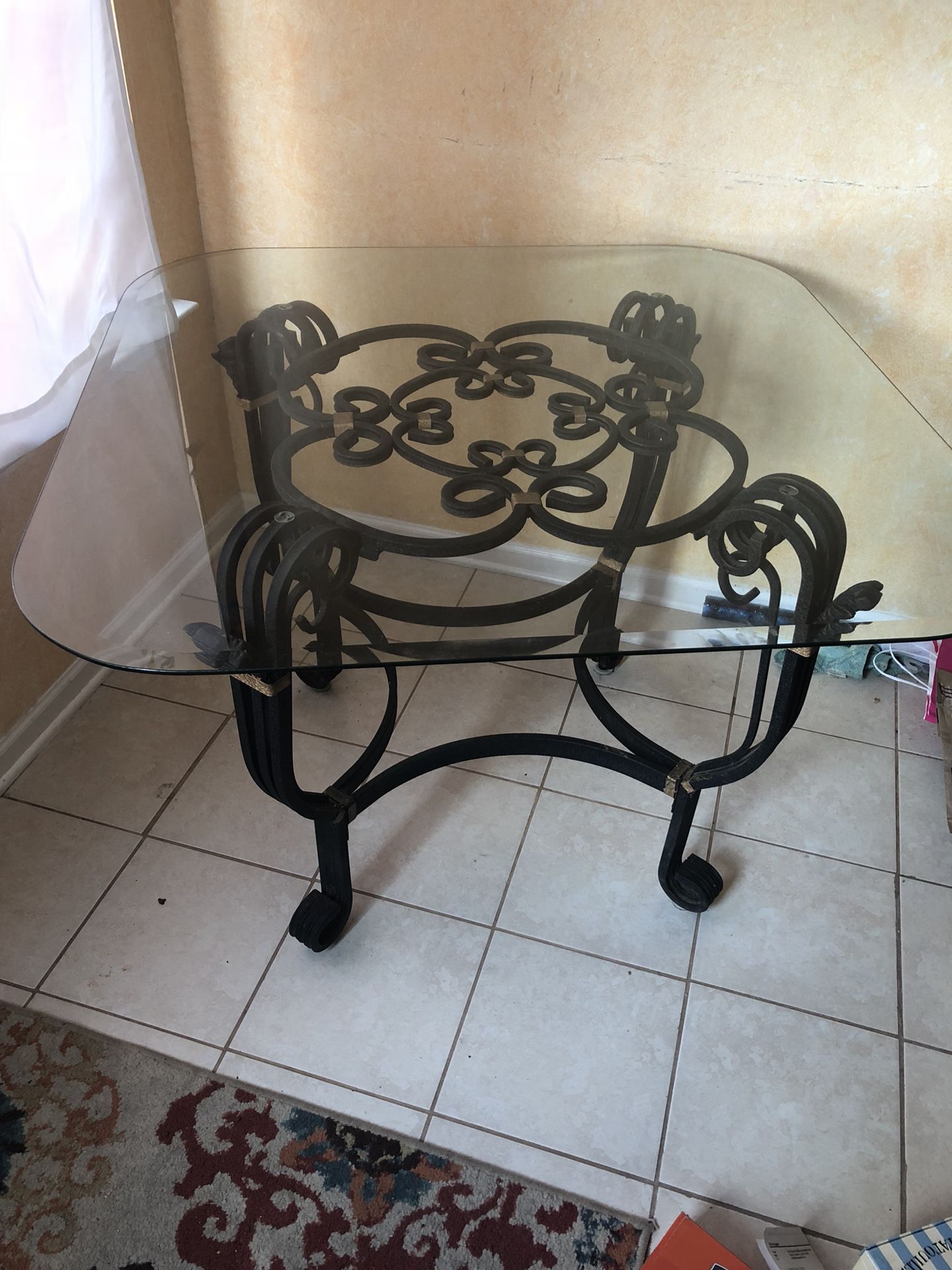 Glass top Table with Wrought Base
