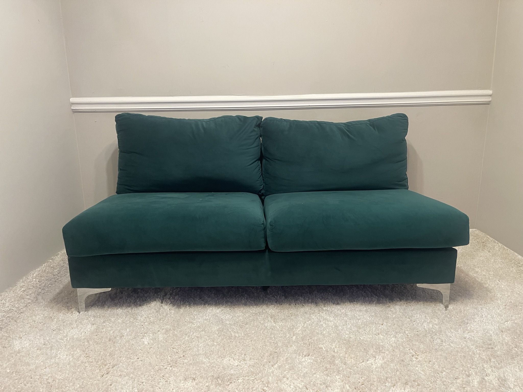 VELVET GREEN COUCH AND WHITE RUG