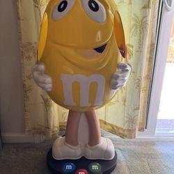 Yellow M&M Display On Wheels 
