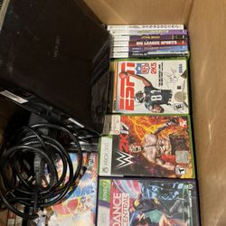 Xbox 360 And Box Of Games