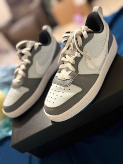 Nike blue gray and white, 4 in US Youth; “Big Kids” size