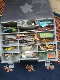 Whole box full of fishing baits.