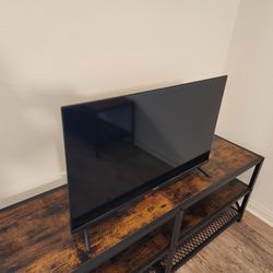 Large TV Stand And 32 Inches HISENSE  TV $40 - 32 (with Roku remote) 