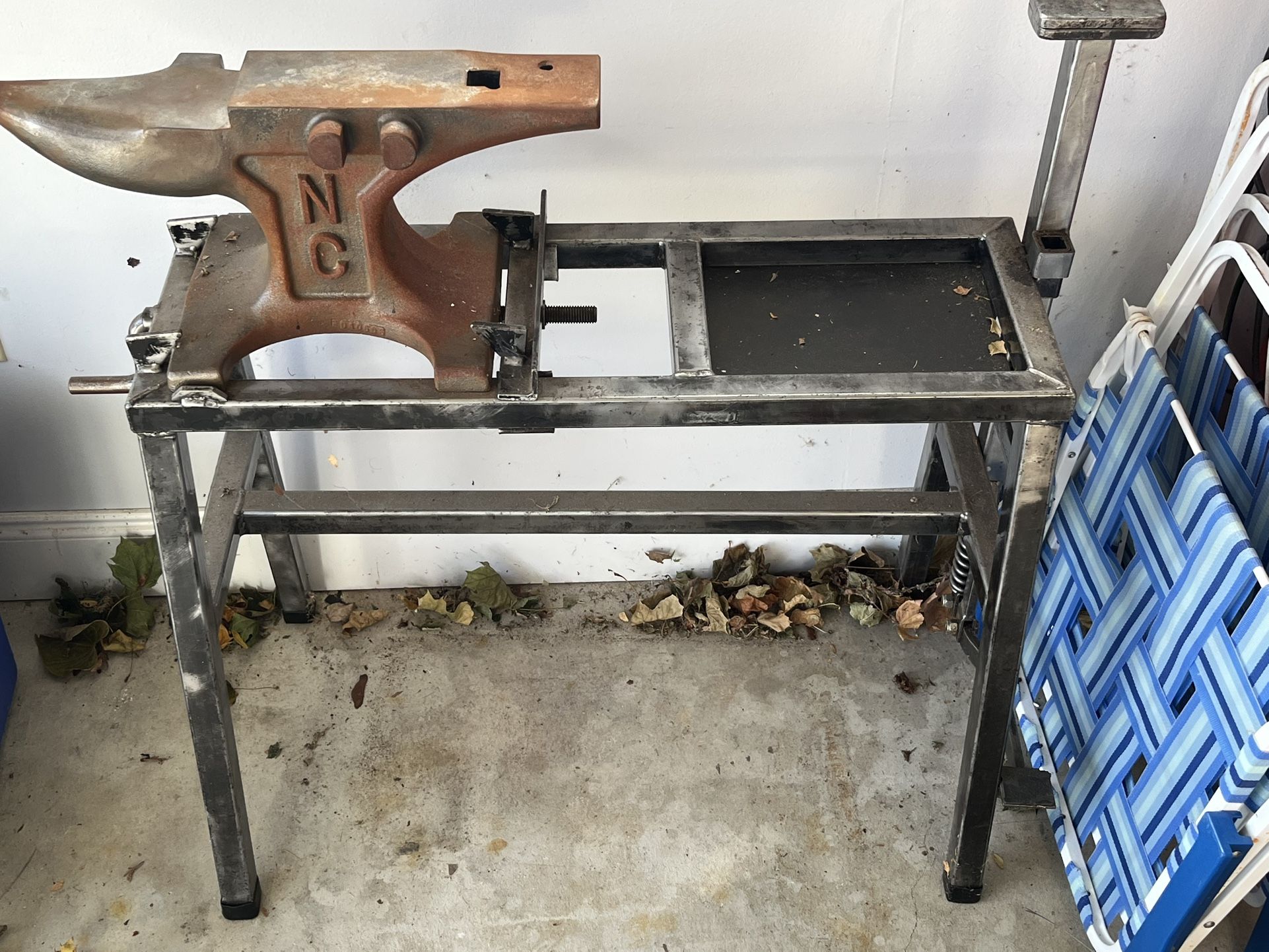 NC farrier Anvil with stand, spring loaded clamp and various tools