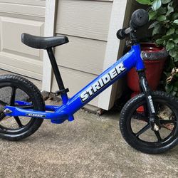 Like New STRIDER Balance Bike with 10” puncture proof tires. 