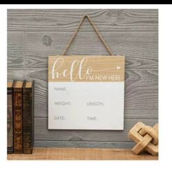 Hello I'm New Here" wood wall decor sign, designed for announcing a baby's birth details.
