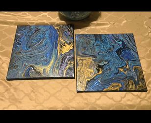 Set of 2 Abstract Acrylic Pour Paintings on stretched canvas featuring swirling patterns.