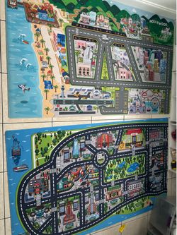 2 large city play mat in good condition (75” x 45”)