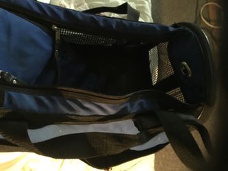 A small dog or cat carrying case
