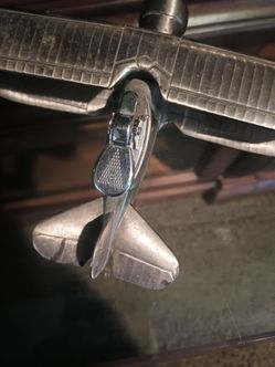 On a cigarette lighter , that's an airplane from the forties , solid silver