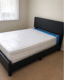 Full size bed frame and a mattress
